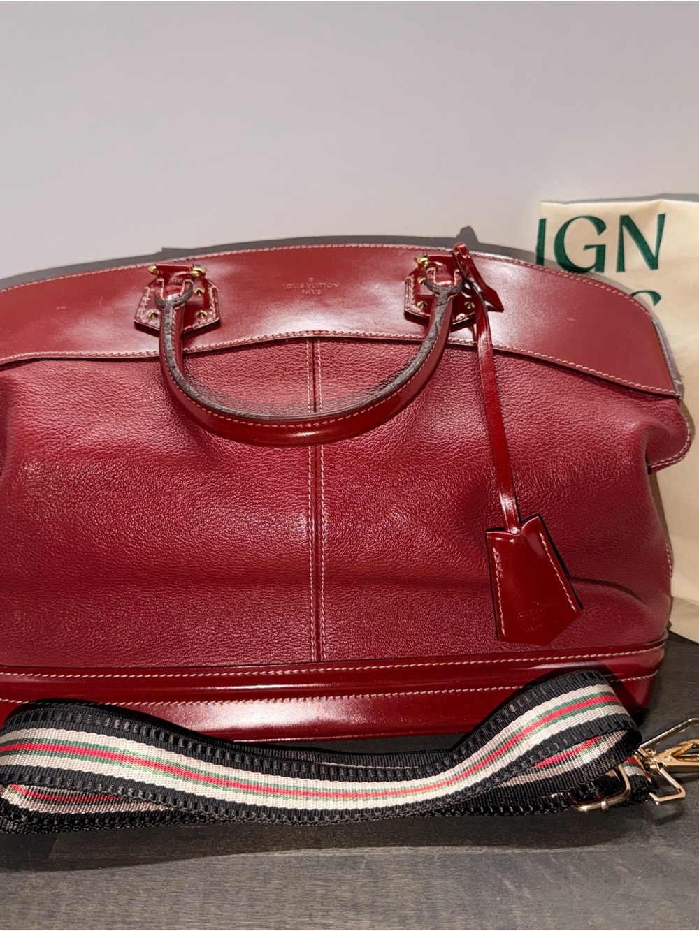 Louis Vuitton Lock It Suhali in Red